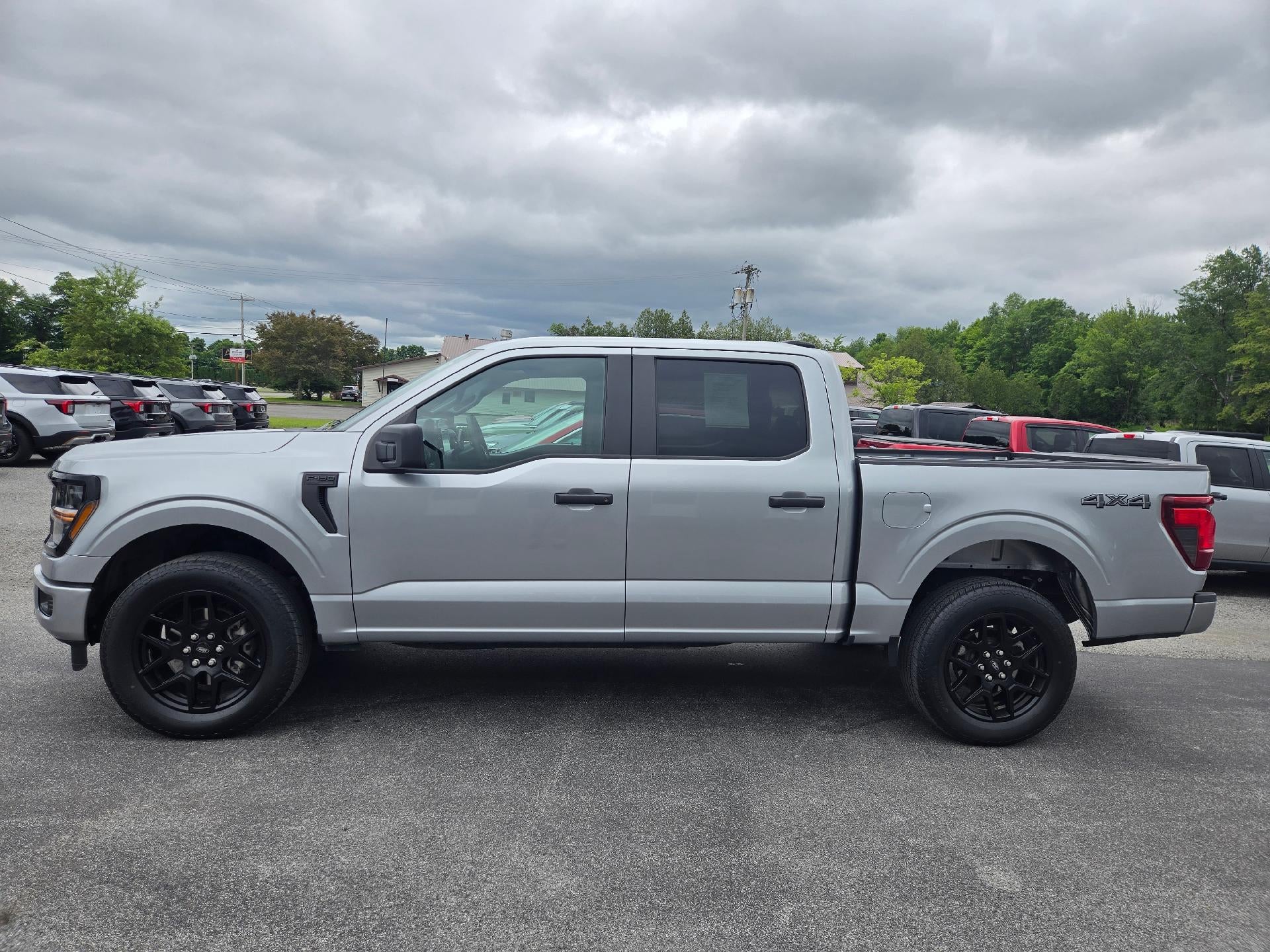2025 Ford F-150 STX 4WD SuperCrew 5.5' Box in Gray — front three-quarter view
